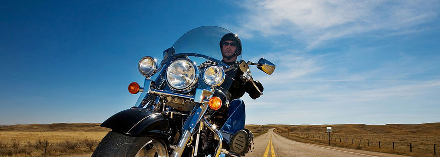 motorcycle driving down a highway
